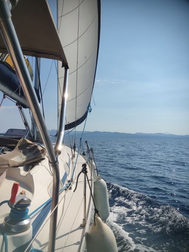 Sail Boat Christina sailing in the crystal-clear waters of Halkidiki during a private yacht cruise
