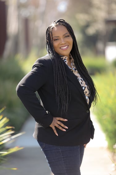 African American women with long braids smiling