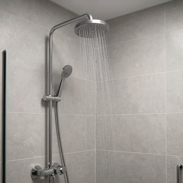 A modern walk-in shower featuring a rainfall showerhead and sleek, light gray tiling in a North American luxury residential setting.