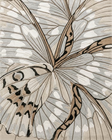 Neutral butterfly-inspired rug with black accents and carved wing details