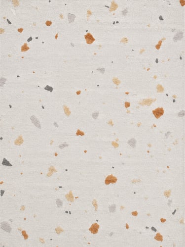 Modern terrazzo pattern area rug with tan, grey, and ochre abstract shapes on a light cream background.