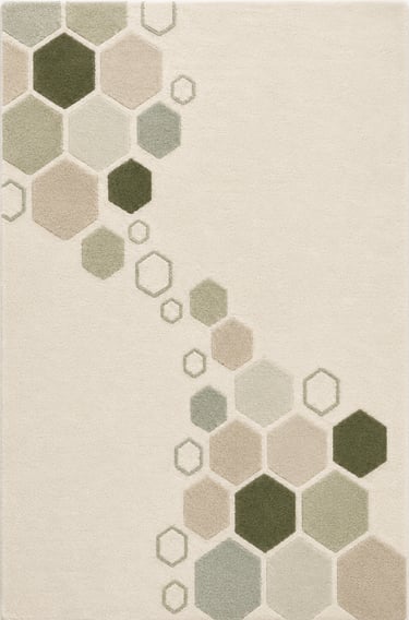 Modern cream area rug featuring a geometric pattern of green and beige hexagons.