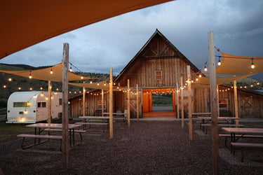 outdoor reception area with bistro lights