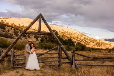 Bride and Father of the Bride in front of Ranch Fence