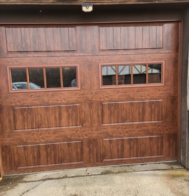 Beautifully installed 9x8 Clopay model GD1LP Walnut Oak