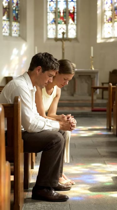Christian dating couple praying together.