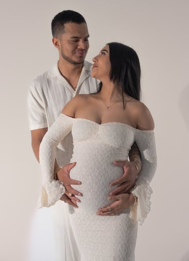 * Studio maternity photoshoot with soft lighting in Toronto.