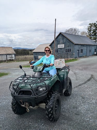 My mother on my '07 Kawasaki Brute Force at my old apartment