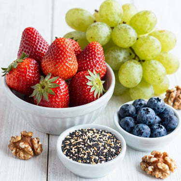 Close-up of fresh, organic ingredients arranged on a wooden table, highlighting natural nutrition.