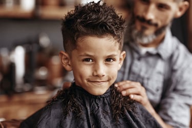 Boy getting haircut