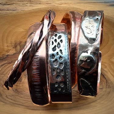 5 copper cuff bracelets made using various techniques