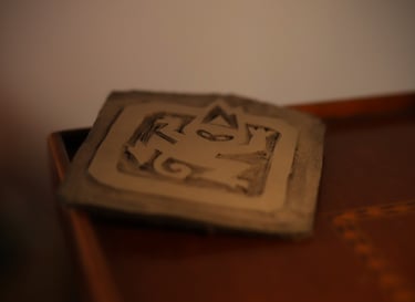 Tampon représentant le logo des éditions du Singe brûlé