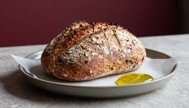 Flat lay of a digital marketing strategy document on a pale parchment green surface next to a ceramic espresso cup.