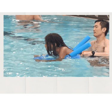 HomeschoolED Heroes participant with swim instructor.