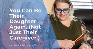 Smiling woman with blue glasses coloring with an elderly relative for senior memory care.