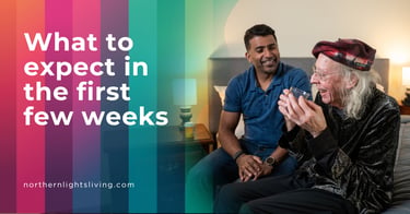 A caregiver smiling and sitting with a senior man in a bedroom, depicting senior care support services.
