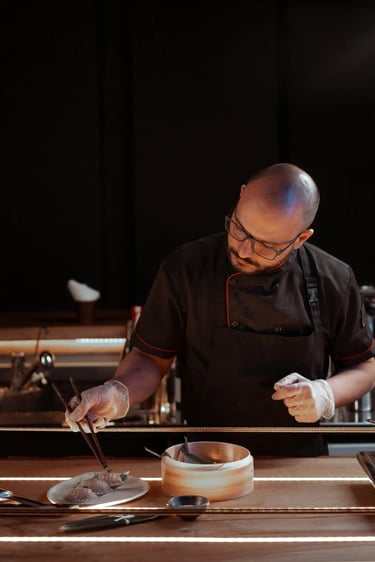 A chef making Peruvian seafood in a restaurant in Lisbon, Portugal