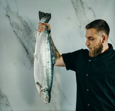 A Peruvian man holding a large fish