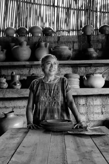 A Peruvian woman preparing ceviche seafood in a restaurant