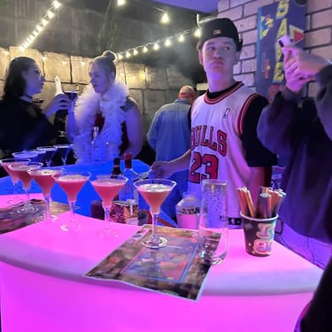Glow Bar with the bar tender in action for a 40th Birthday in Victoriapoint, Redlands - party hire by SweetAz Co.