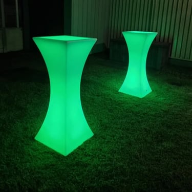 Green glow cocktail tables in the back yard of a halloween event in Redlands.