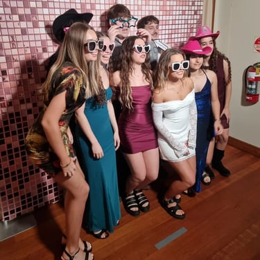 Photo Booth with a group of guests posing at an 18th Birthday in Mudgeeraba, Gold Coast - party hire by SweetAz Co.