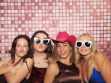 Photo Booth guests with props during an 18th Celebration in Mudgeeraba, Gold Coast - party hire by SweetAz Co.