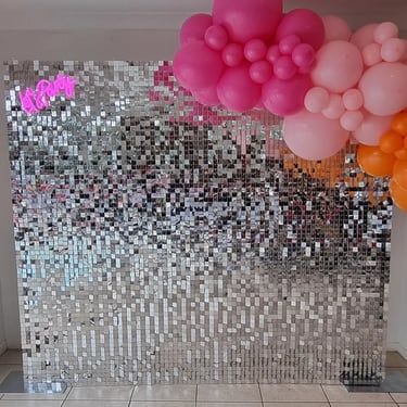 Silver shimmer wall and balloon garland for Nadia's hens party in the Gold Coast.