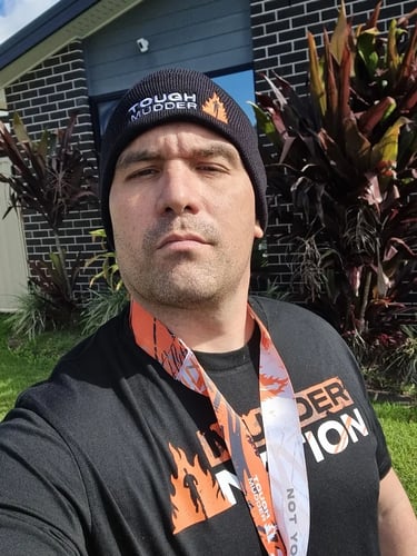 Sweetazco Team home and proud with medal from Tough Mudder in Mountcotton, Redlands - party hire by SweetAz Co.