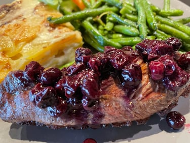Duck magret with blueberry sauce