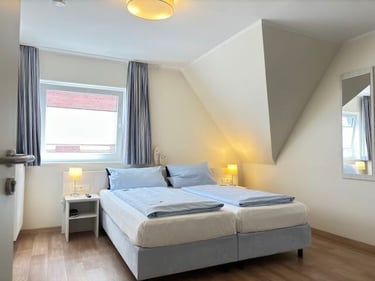 Hotel DunenNest - Kleine Suite, separates Schlafzimmer, bequemes Bett