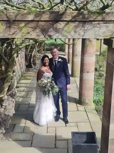 Couple Outdoors In Wedding Dress and Suit 
