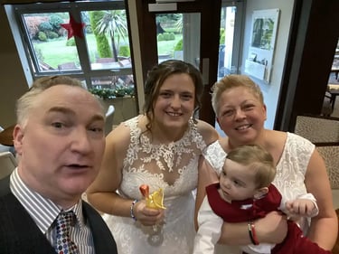 Couple Celebrating With A Glass Of Bubbly