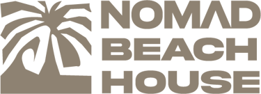 Nomad Beach House logo