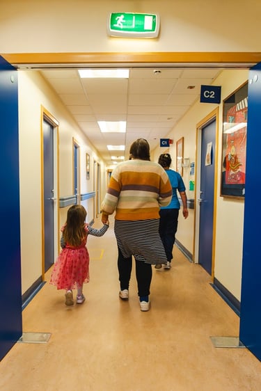 Art of Birth hospital corridor mother daughter