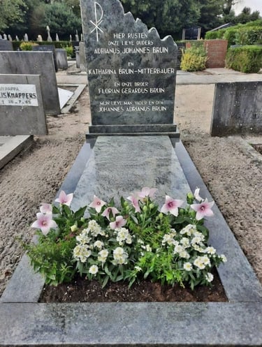 een graf verzogt door grafzorg Memoriam met lage beplanting