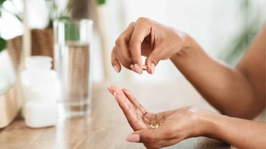 woman preparing daily supplements healthy morning routine over 35 wellness