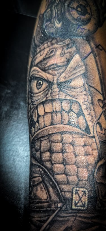 Tatouage réaliste de Archibald fait à genappe 
