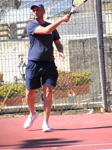 Jason With a Crosscourt Forehand