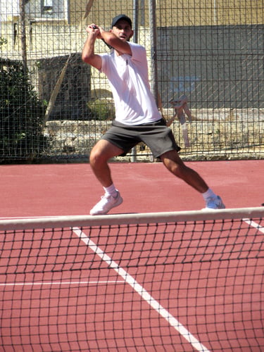 Renzo Returns With a Double-handed Backhand