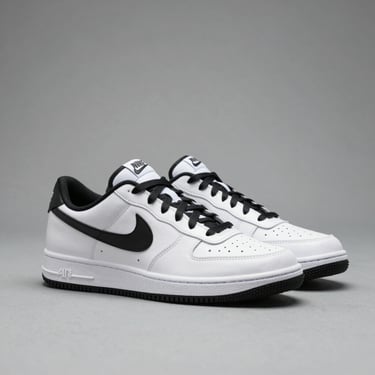 Casual sneakers displayed on a minimalist shelf with natural lighting.