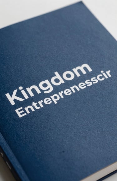 Close-up of a printed publication focusing on Kingdom entrepreneurship, with clean lines and a slate midnight blue color palette.