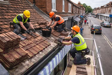 Shepperton Roofing carrying out roof repairs to a shop in Shepperton