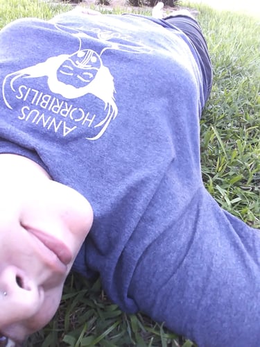 woman laying on the grass