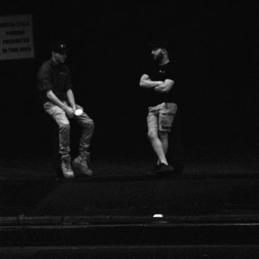 Dream-like image of two men chatting.
