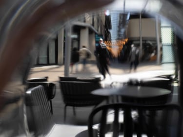 A photo taken through a water glass.