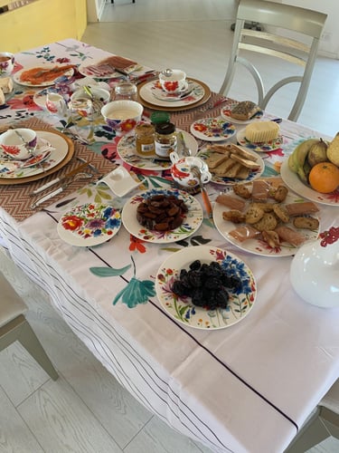 The grand, copious three-time breakfast with organic produce served indoor at Domaine Des Lucques