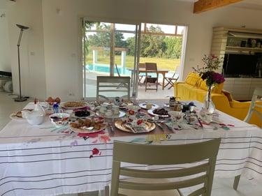 The grand, copious three-time breakfast with organic produce served indoor at Domaine Des Lucques