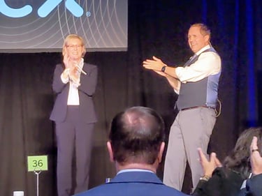 San Jose mentalist David Martinez performs on stage at a corporate event.
