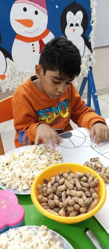 Child experimenting with sensory materials in therapy